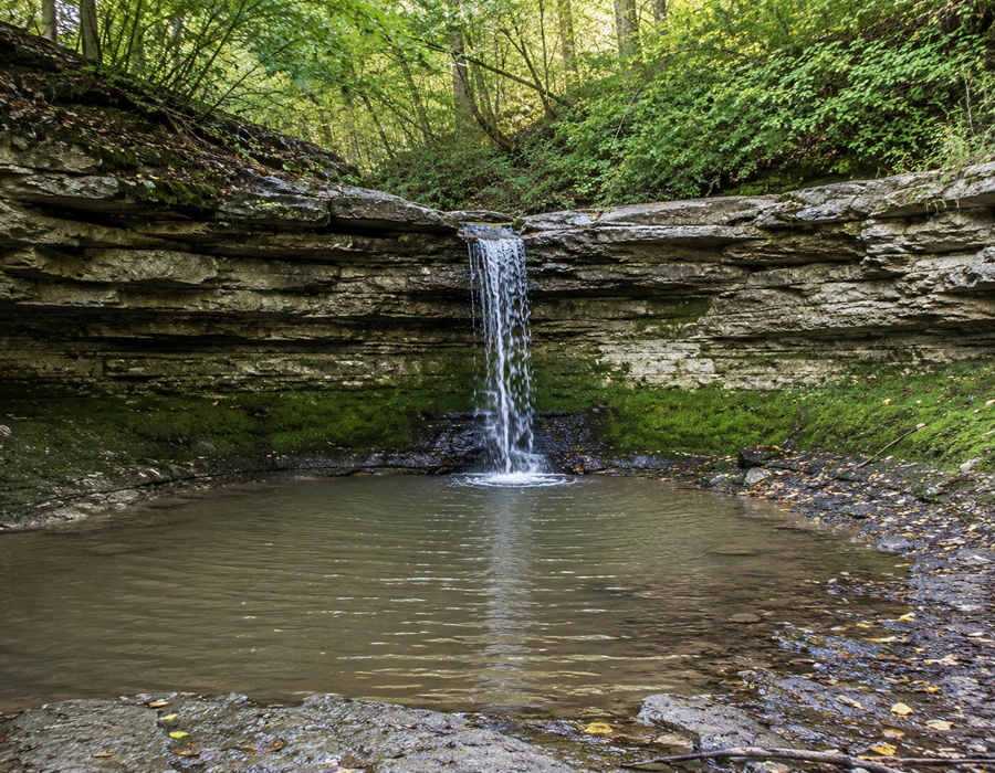 Cascading waterfalls and forest gorge near Saharna Monastery, Moldova